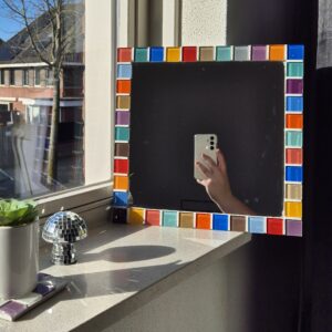 Tiled mirror with colorful glass tiles