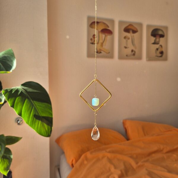 20251104_114551~2-EDIT Suncathcers with reflective glass pendants