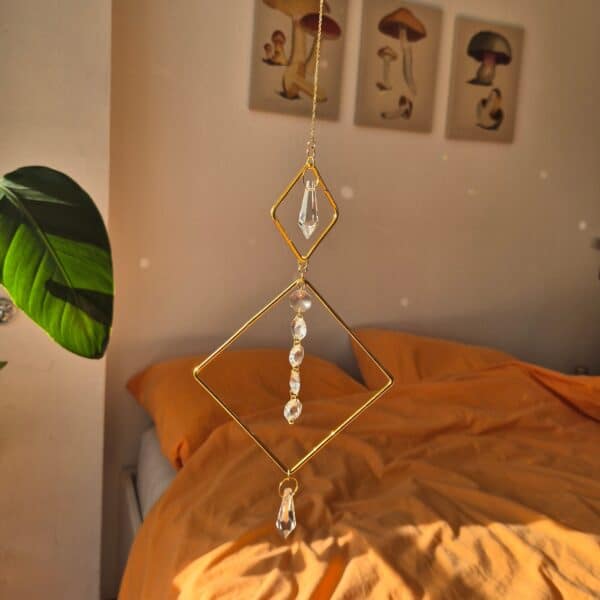 20251104_114635~2-EDIT Suncathcers with reflective glass pendants