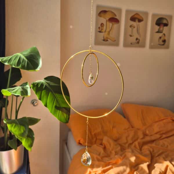 20251104_114819~2-EDIT Suncathcers with reflective glass pendants